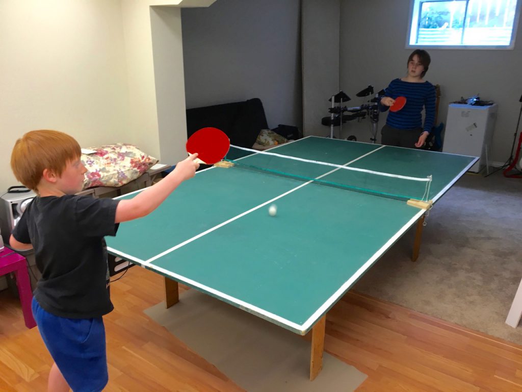 Ian and Miranda playing ping pong 