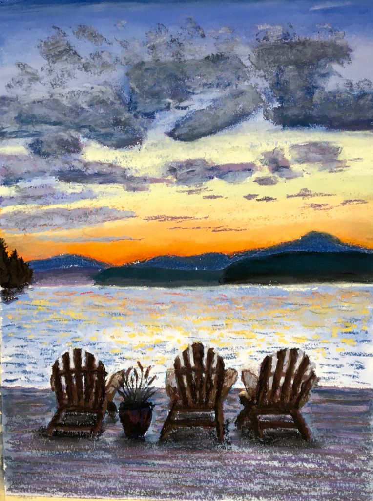 Adirondack chairs and a sunset
